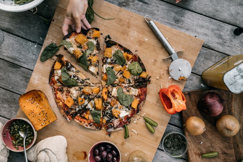 Supreme loaded pizza with fresh toppings at Green lantern pizza